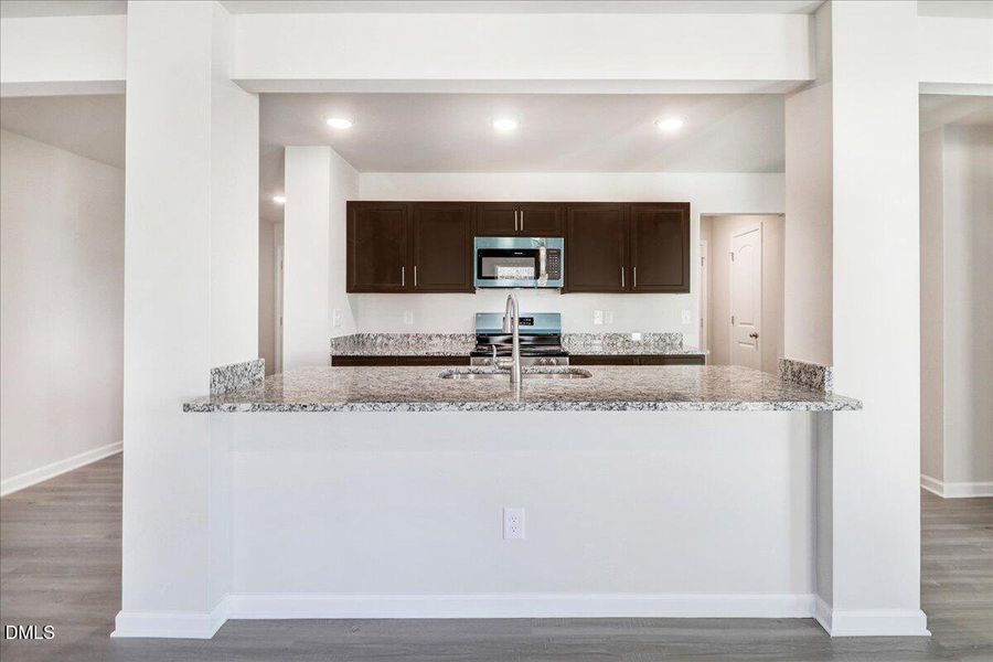 22-Kitchen with island and granite count