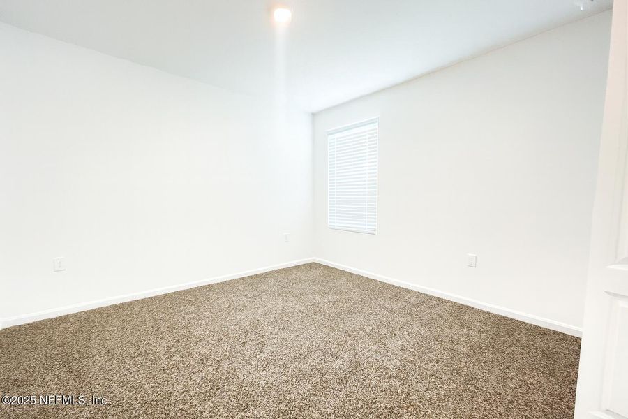 Spacious, unfurnished interior of a new home in The Arbors, Jacksonville (Image 16).