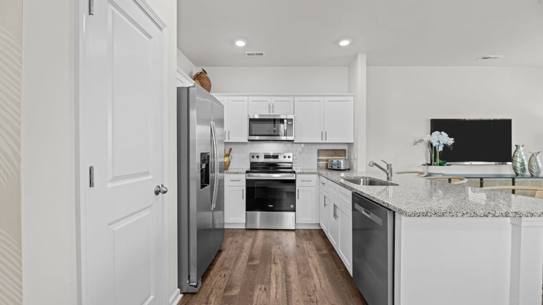 Furnished interior view inside a new home in Clock Road Townhomes, New Bern (Image 7).