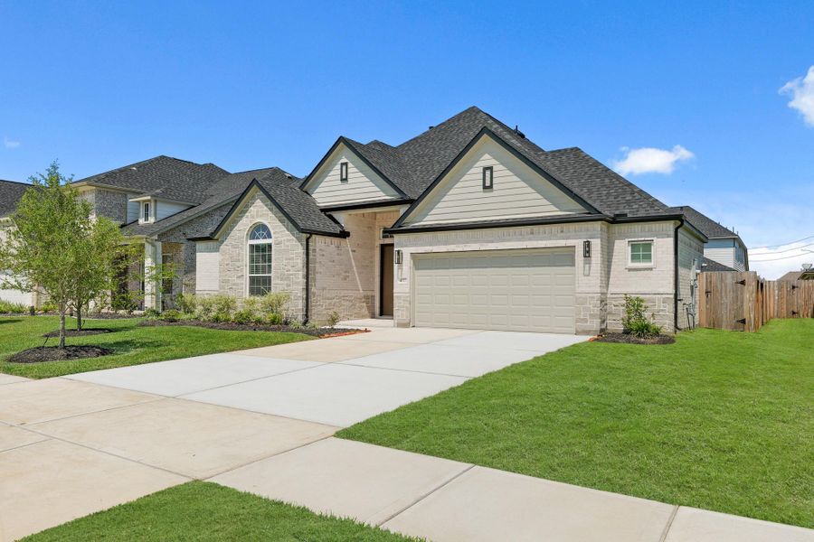 Front exterior of a new home in Briarwood Crossing, Rosenberg, TX, highlighting curb appeal (Image 19).
