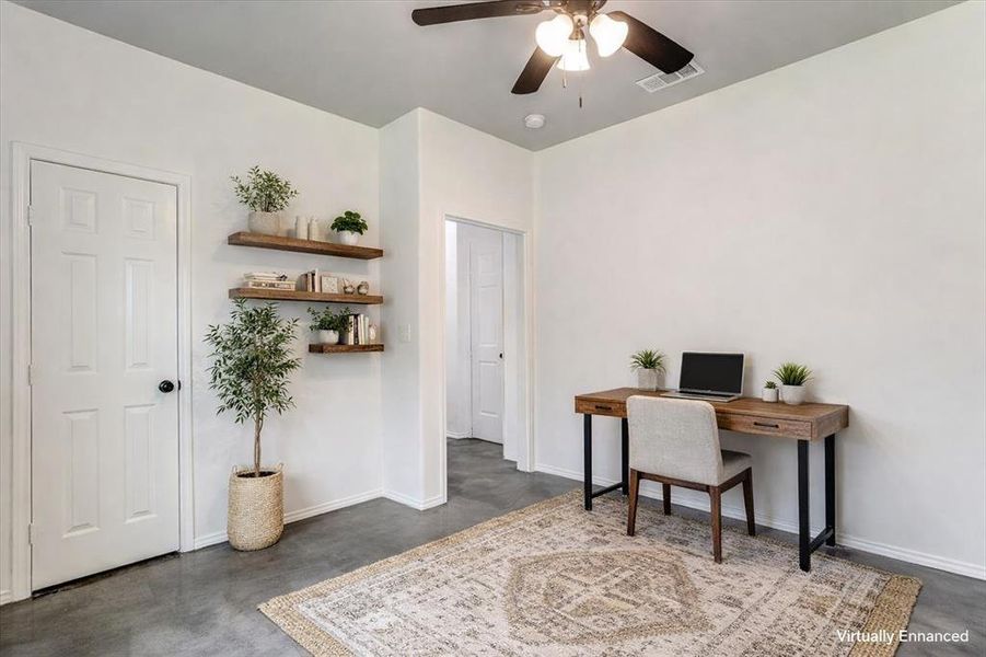 Room featuring wood-finish floating shelves, a ceiling fan with integrated lighting, two panel doors, and gray concrete flooring