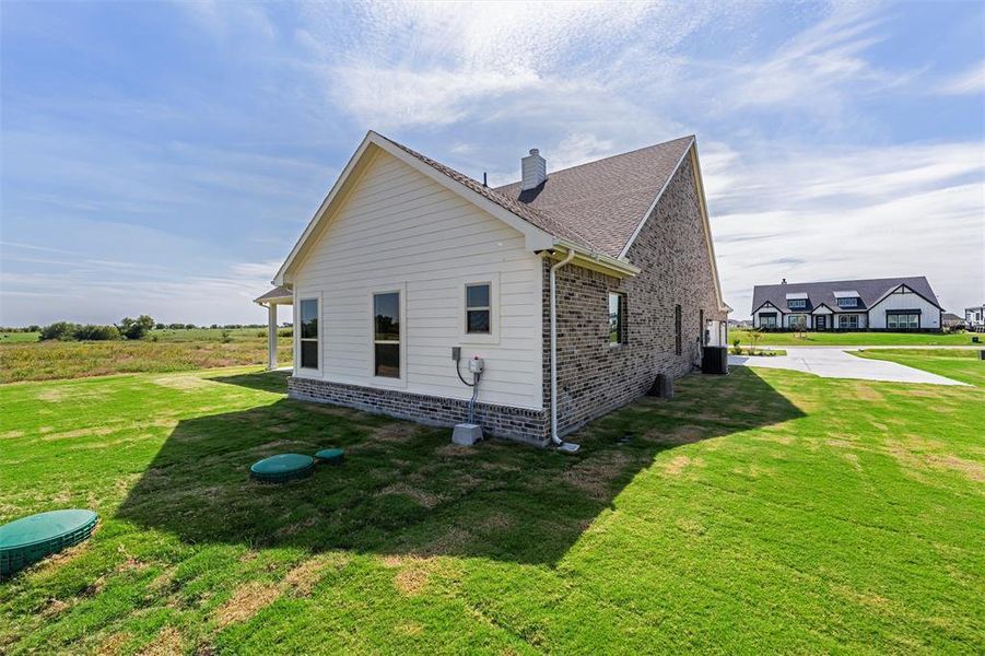 Exterior details and patio area of a home in Rocky Top, Krum (Image 4). Exterior details and patio area of a home in Rocky Top, Krum (Image 4).