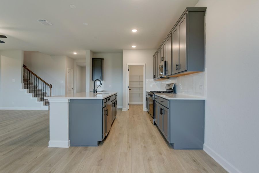 Representative furnished interior of a home built from the Jordan by Ashton Woods in Hennersby Hollow, San Antonio (Image 14).