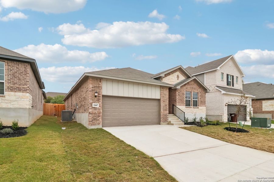Front exterior of a new home in , San Antonio, TX, highlighting curb appeal (Image 1). Front exterior of a new home in , San Antonio, TX, highlighting curb appeal (Image 1).