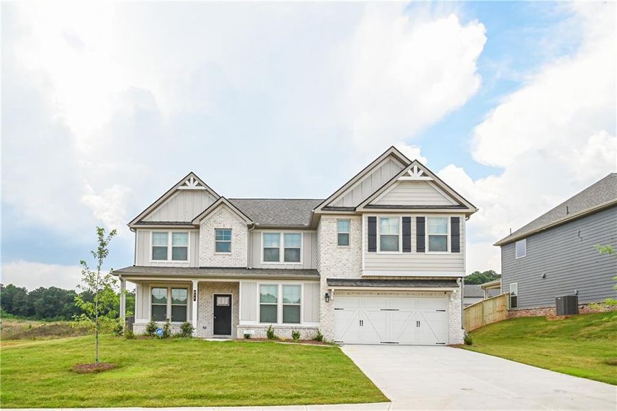 Front exterior of a new home in , Stockbridge, GA, highlighting curb appeal (Image 41).