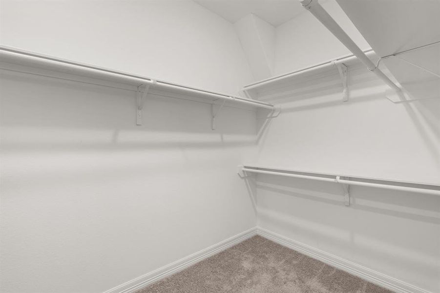 A view of your large primary walk-in Closet