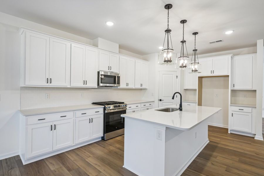 Representative furnished interior of a home built from the Craven by Ashton Woods in Crescent Mills, Wilson's Mills (Image 3). Representative furnished interior of a home built from the Craven by Ashton Woods in Crescent Mills, Wilson's Mills (Image 3).