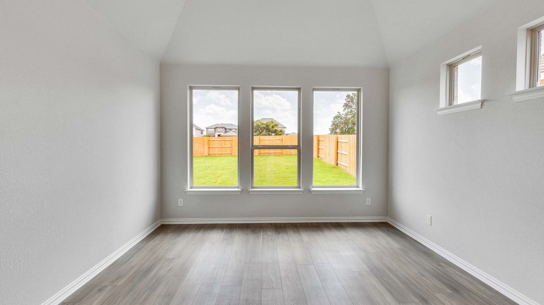 Furnished interior view inside a new home in Oaks at San Gabriel, Georgetown (Image 18).