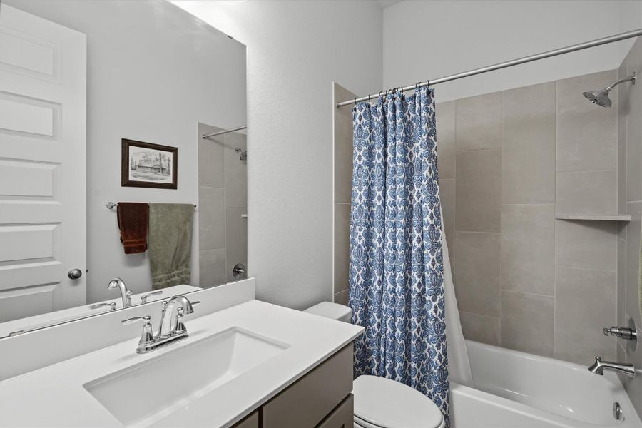 Third full bath with fully tiled tub/shower combo Third full bath with fully tiled tub/shower combo