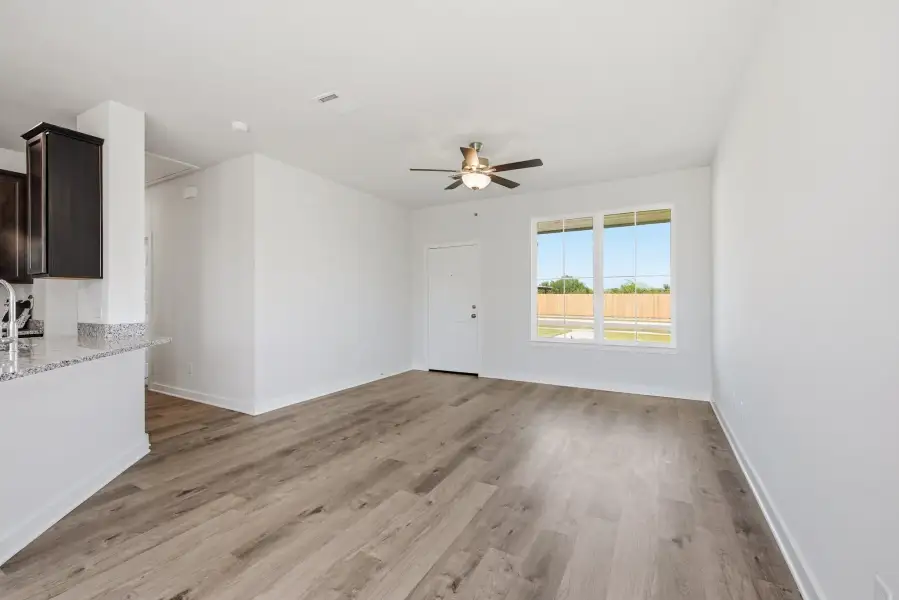 Spacious, unfurnished interior of a new home in The Cottages at Pagosa Springs, Bryan (Image 6).