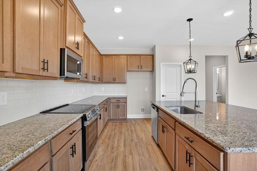 Furnished interior view inside a new home in , Homer (Image 11). Furnished interior view inside a new home in , Homer (Image 11).