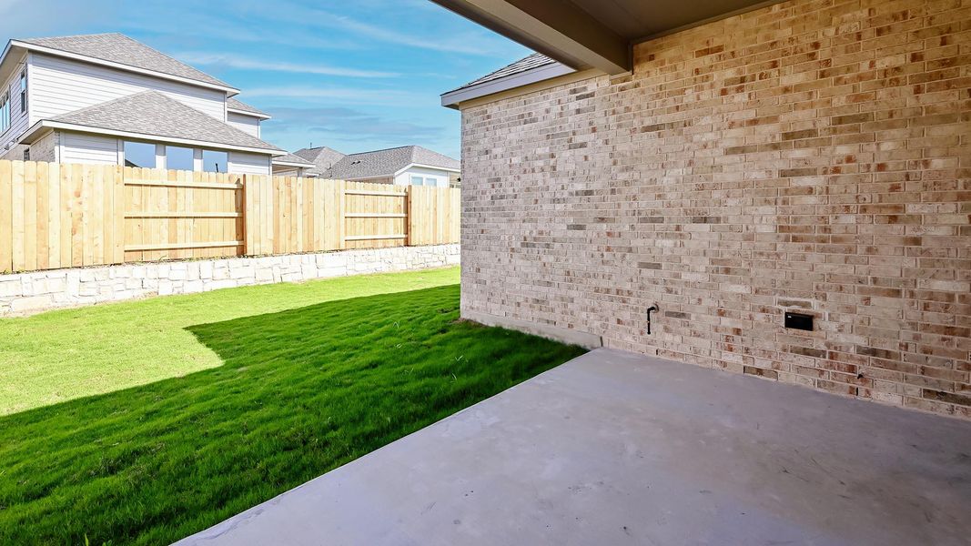 Front exterior of a new home in Crosswinds 50', Kyle, TX, highlighting curb appeal (Image 19). Front exterior of a new home in Crosswinds 50', Kyle, TX, highlighting curb appeal (Image 19).