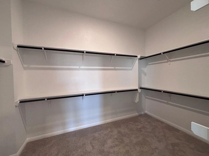 Spacious, unfurnished interior of a new home in The Colony, Bastrop (Image 22).