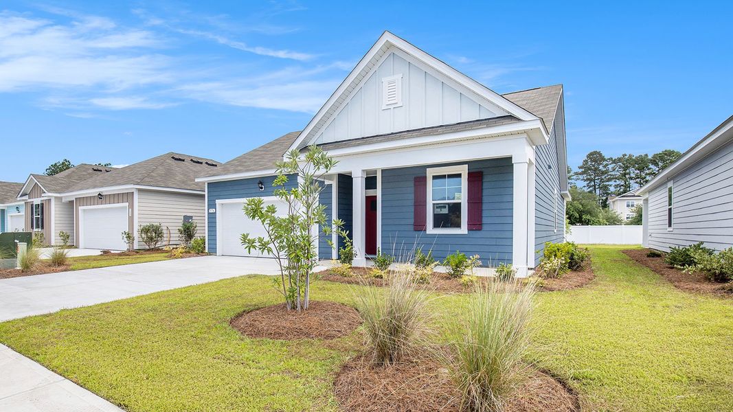 Front exterior of a new home in Kingston Bay, Conway, SC, highlighting curb appeal (Image 2).