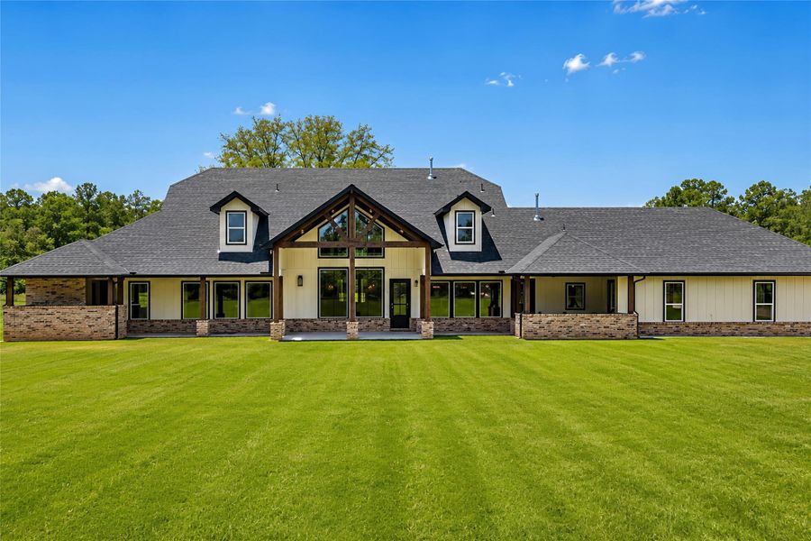 Front exterior of a new home in , Huntsville, TX, highlighting curb appeal (Image 1). Front exterior of a new home in , Huntsville, TX, highlighting curb appeal (Image 1).