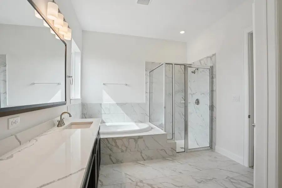 Furnished interior view inside a new home in Del Bello Lakes 60', Manvel (Image 17).