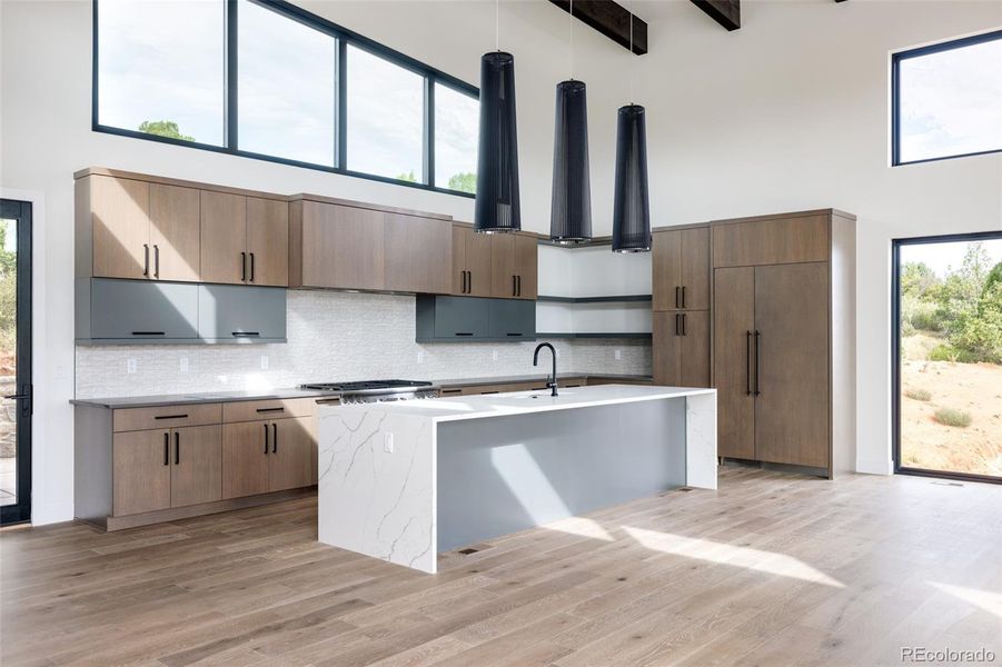 Generous kitchen island and storage + pantry