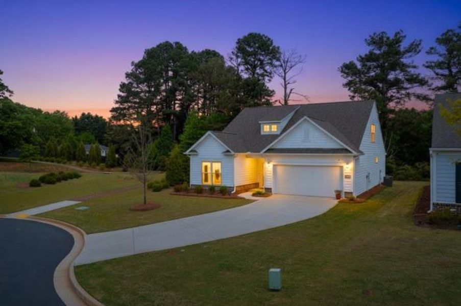 Front exterior of a new home in Wimberly, Powder Springs, GA, highlighting curb appeal (Image 26).