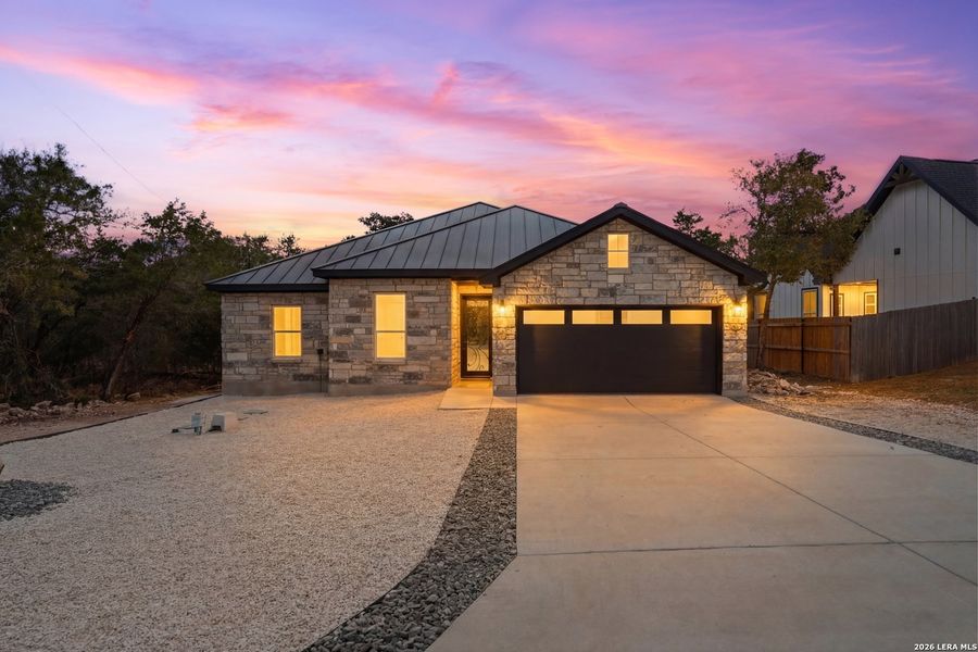 Front exterior of a new home in , Spring Branch, TX, highlighting curb appeal (Image 20).