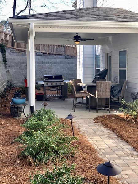 Exterior details and patio area of a home in Holiday Pines, Buford (Image 3).