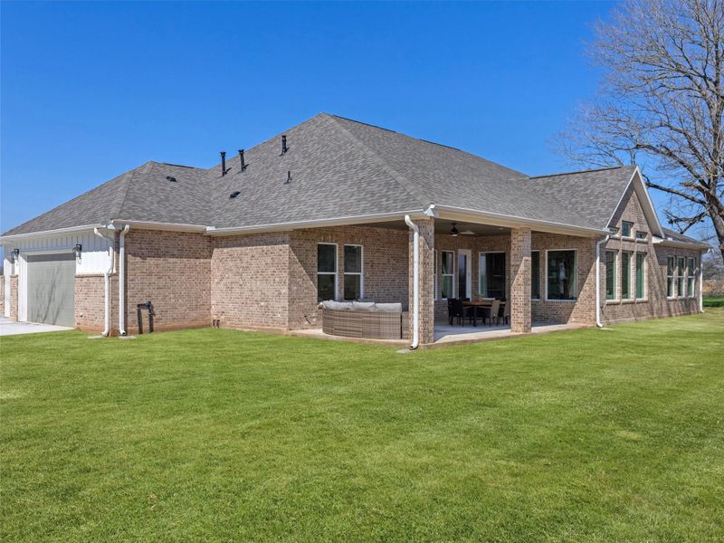 Exterior details and patio area of a home in , Smithville (Image 25).