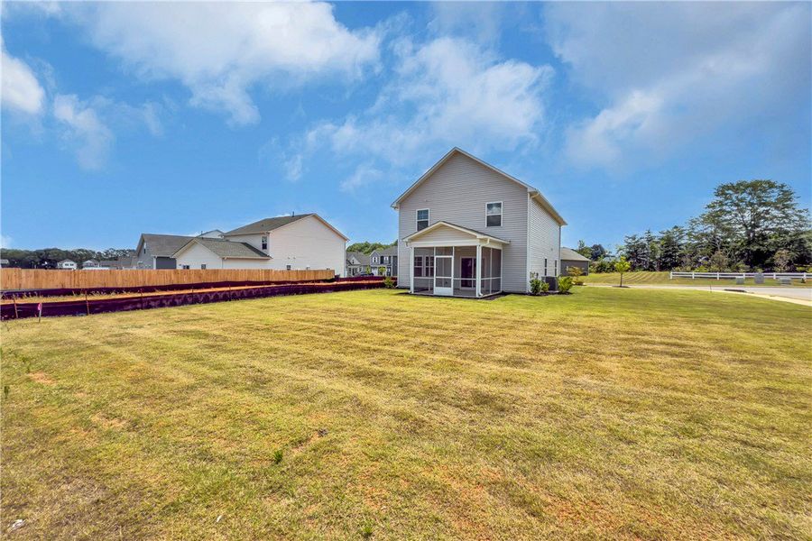 Front exterior of a new home in Brownstone Park, Easley, SC, highlighting curb appeal (Image 1).