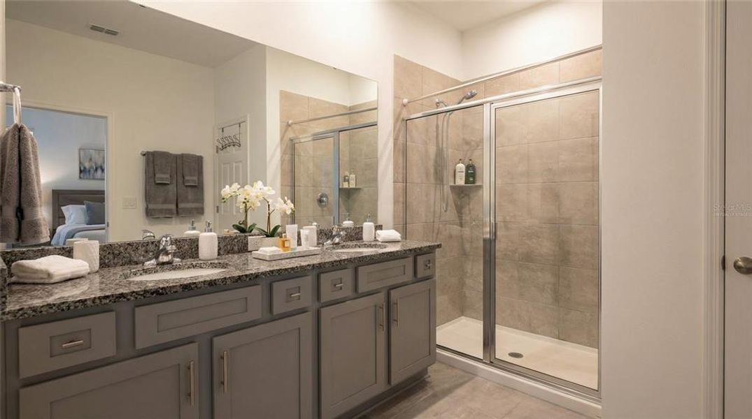Furnished interior view inside a new home in Village at Windsor Reserve, Eagle Lake (Image 9).