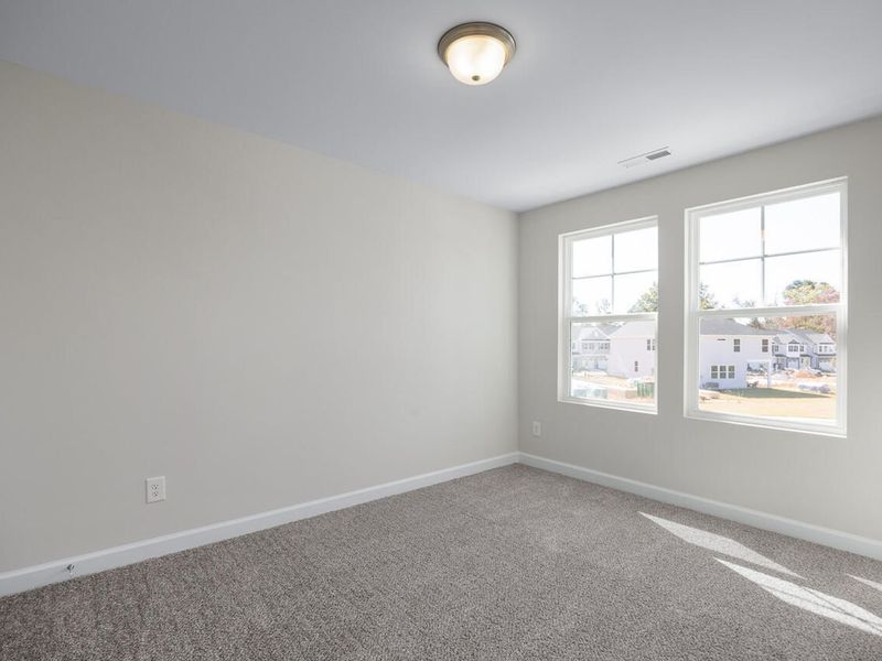 Spacious, unfurnished interior of a new home in Woodland Crossing, Zebulon (Image 22).