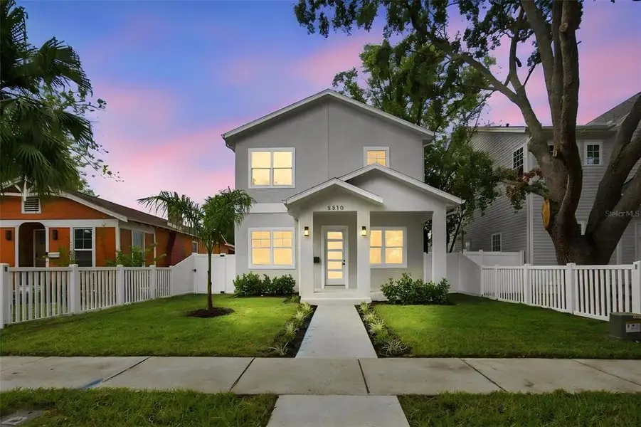 Front exterior of a new home in , St. Petersburg, FL, highlighting curb appeal (Image 31). Front exterior of a new home in , St. Petersburg, FL, highlighting curb appeal (Image 31).