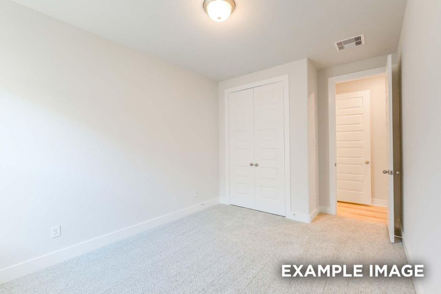 Spacious, unfurnished interior of a new home in Sunterra, Katy (Image 25).
