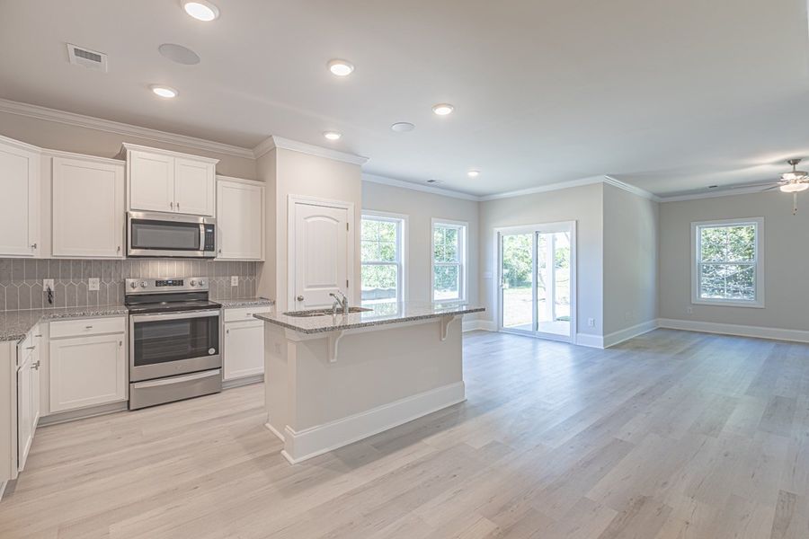 Representative furnished interior of a home built from the Habersham II by Great Southern Homes in Old Charleston Acres, Pelion (Image 18).