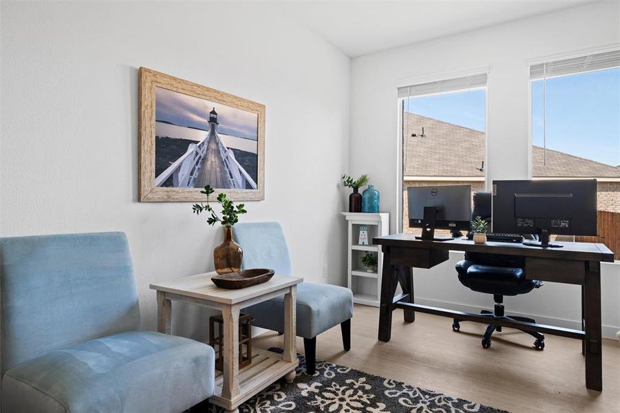 Office area featuring light wood-style floors Office area featuring light wood-style floors
