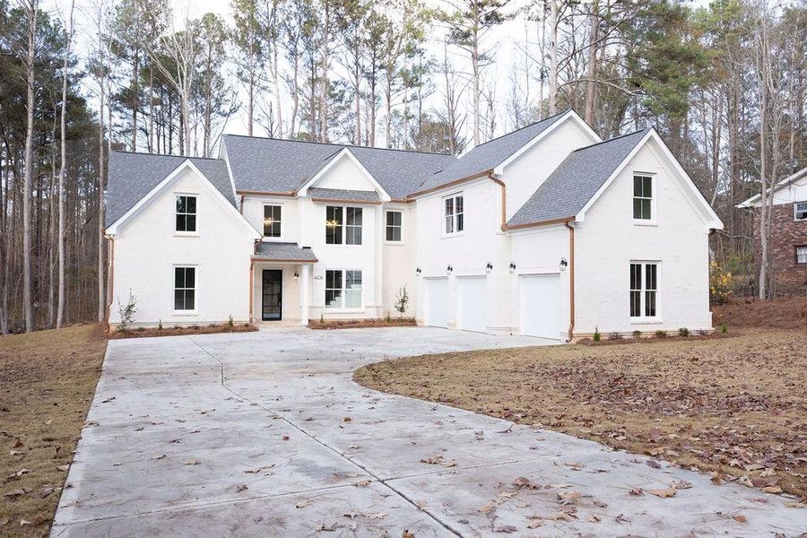 Front exterior of a new home in , Atlanta, GA, highlighting curb appeal (Image 30).