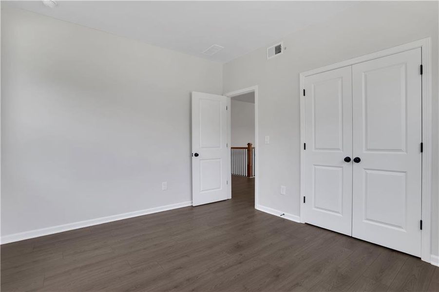 Spacious, unfurnished interior of a new home in The Paddocks at Doc Hughes, Buford (Image 31). Spacious, unfurnished interior of a new home in The Paddocks at Doc Hughes, Buford (Image 31).