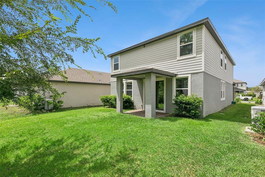 Exterior details and patio area of a home in , Daytona Beach (Image 31).