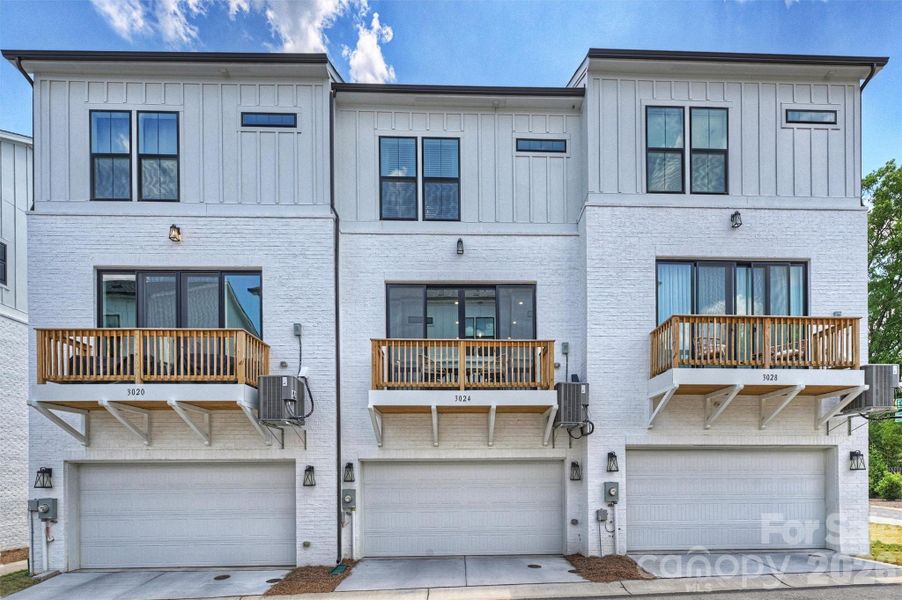 Front exterior of a new home in The Townes of Cotswold, Charlotte, NC, highlighting curb appeal (Image 22).