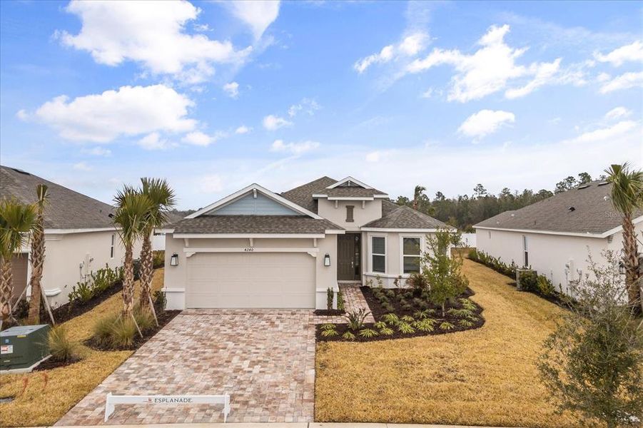 Front exterior of a new home in , Kissimmee, FL, highlighting curb appeal (Image 2). Front exterior of a new home in , Kissimmee, FL, highlighting curb appeal (Image 2).