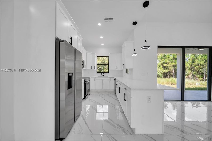 Furnished interior view inside a new home in , Lehigh Acres (Image 8).