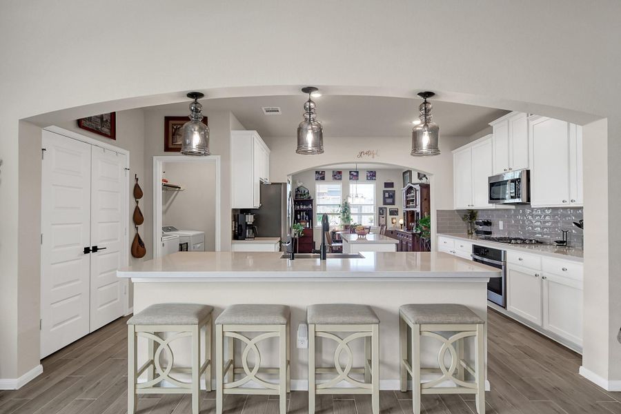 The kitchen is situated in the center of the home in between the living room and breakfast/dining room.