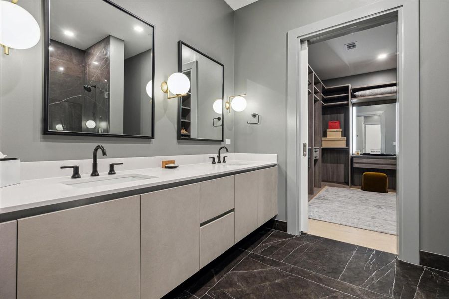 Primary bathroom and large walk in.