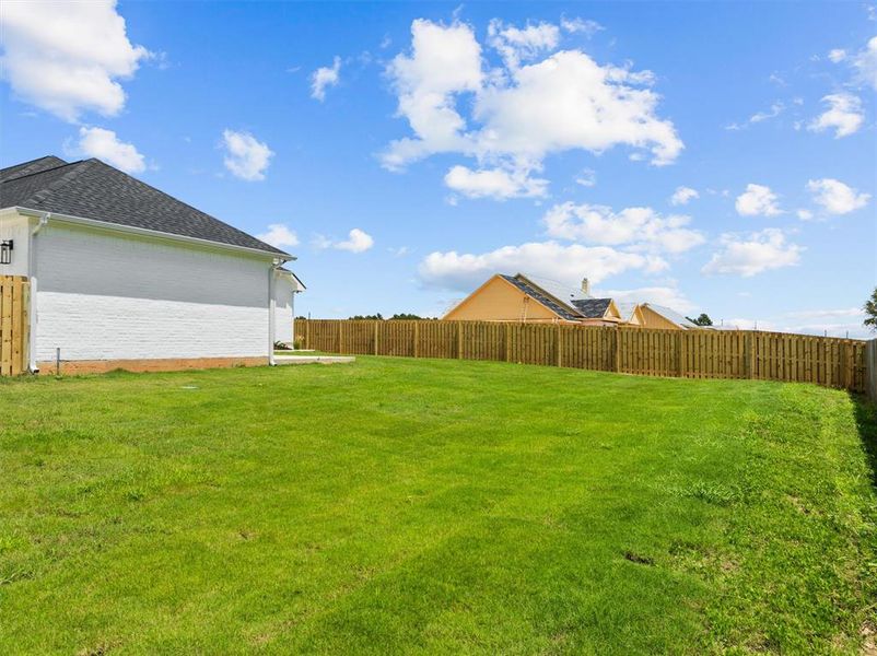 Exterior details and patio area of a home in , Lindale (Image 25).