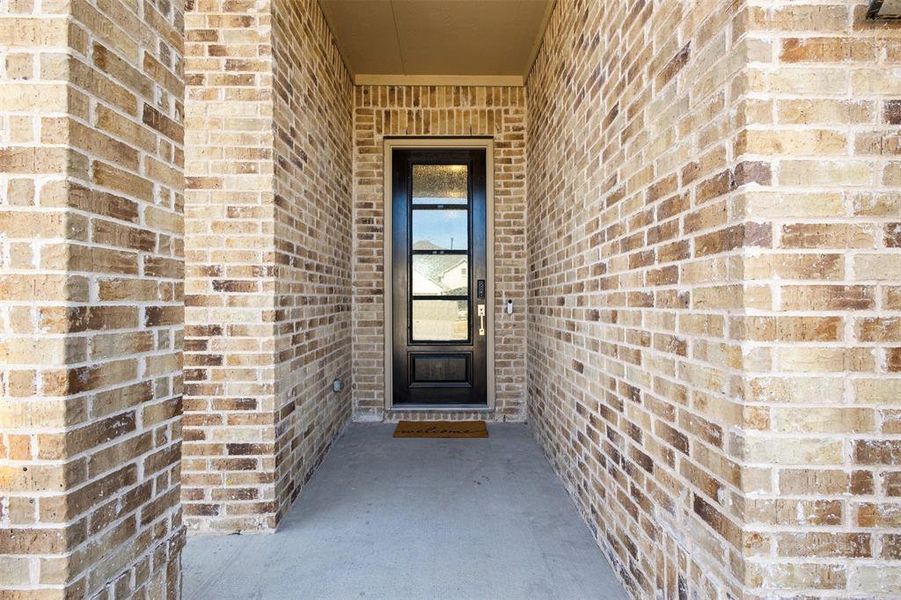 Exterior details and patio area of a home in Union Park Classic 60, Little Elm (Image 26).