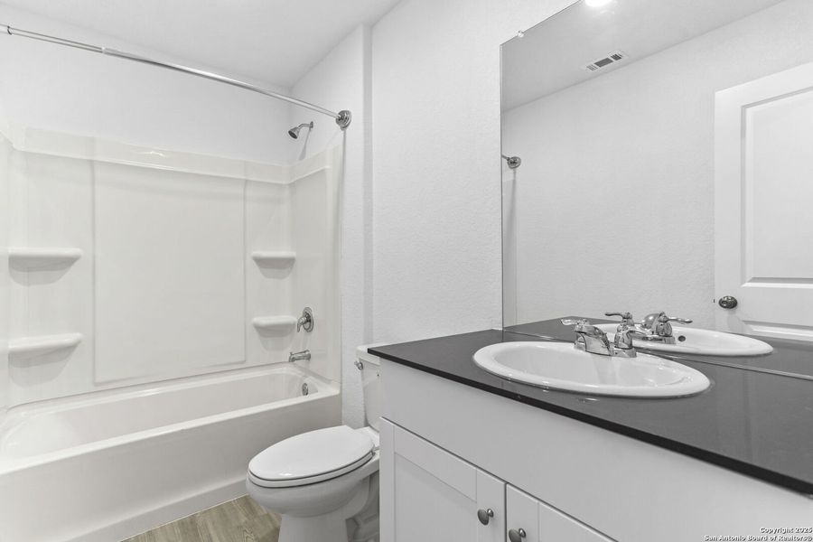 Furnished interior view inside a new home in , Bulverde (Image 6).