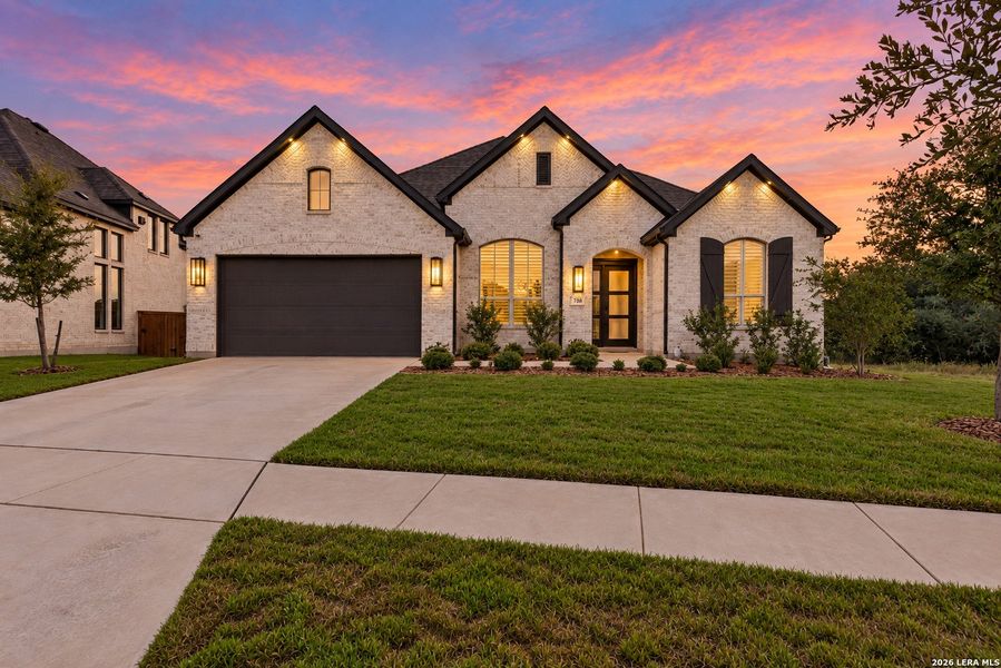 Front exterior of a new home in Veramendi, New Braunfels, TX, highlighting curb appeal (Image 23).