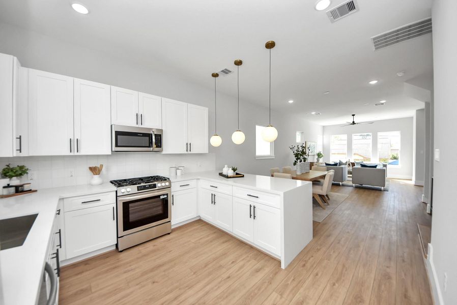 Furnished interior view inside a new home in Skyline Homes at Cavalcade, Houston (Image 31). Furnished interior view inside a new home in Skyline Homes at Cavalcade, Houston (Image 31).