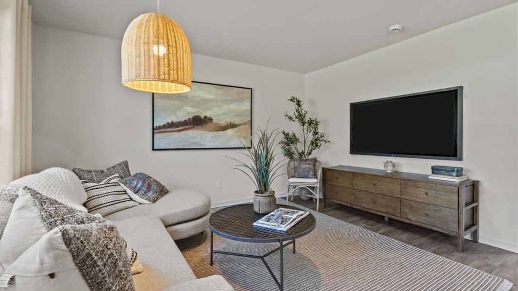 Representative furnished interior of a home built from the BELHAVEN by D.R. Horton in Cross Creek, Spring Lake (Image 6).