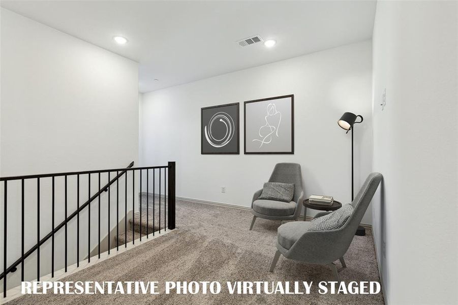 The loft area in our Channing plan features open railings that create a lovely space perfect for a reading nook or pocket office!  REPRESENTATIVE PHOTO VIRTUALLY STAGED