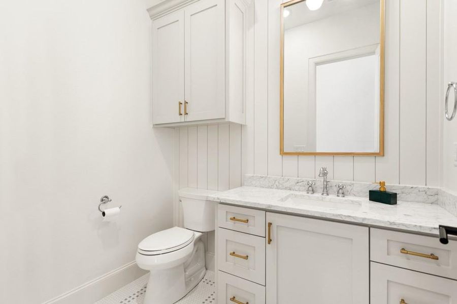 Bathroom featuring vanity and tile patterned flooring