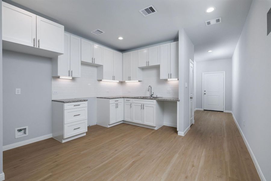 Furnished interior view inside a new home in , Spring (Image 3). Furnished interior view inside a new home in , Spring (Image 3).