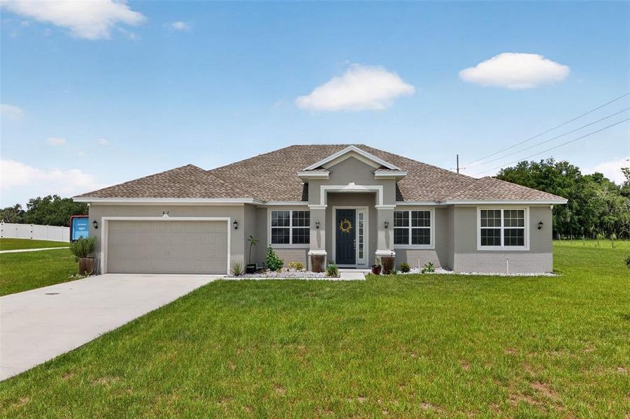 Front exterior of a new home in , Bartow, FL, highlighting curb appeal (Image 20). Front exterior of a new home in , Bartow, FL, highlighting curb appeal (Image 20).
